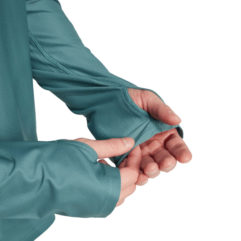 The thumb loops on the adidas Men's Own The Run Base Long Sleeve in the Preloved Teal colourway. (8751018180770)