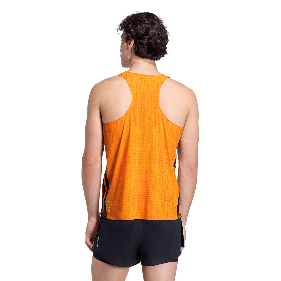 Back view of a model wearing the adidas Men's Adizero Singlet in the Pure Tangerine/Pure Orange colourway.