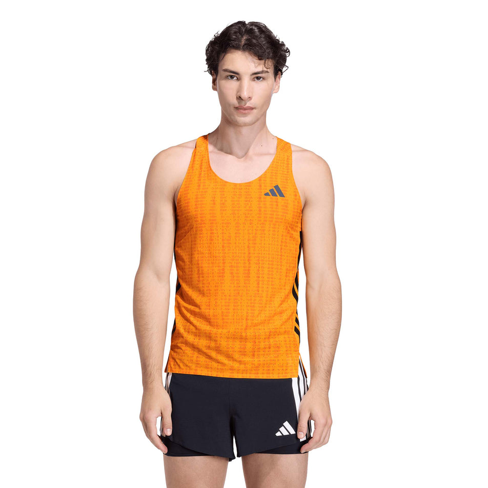 Front view of a model wearing the adidas Men's Adizero Singlet in the Pure Tangerine/Pure Orange colourway.