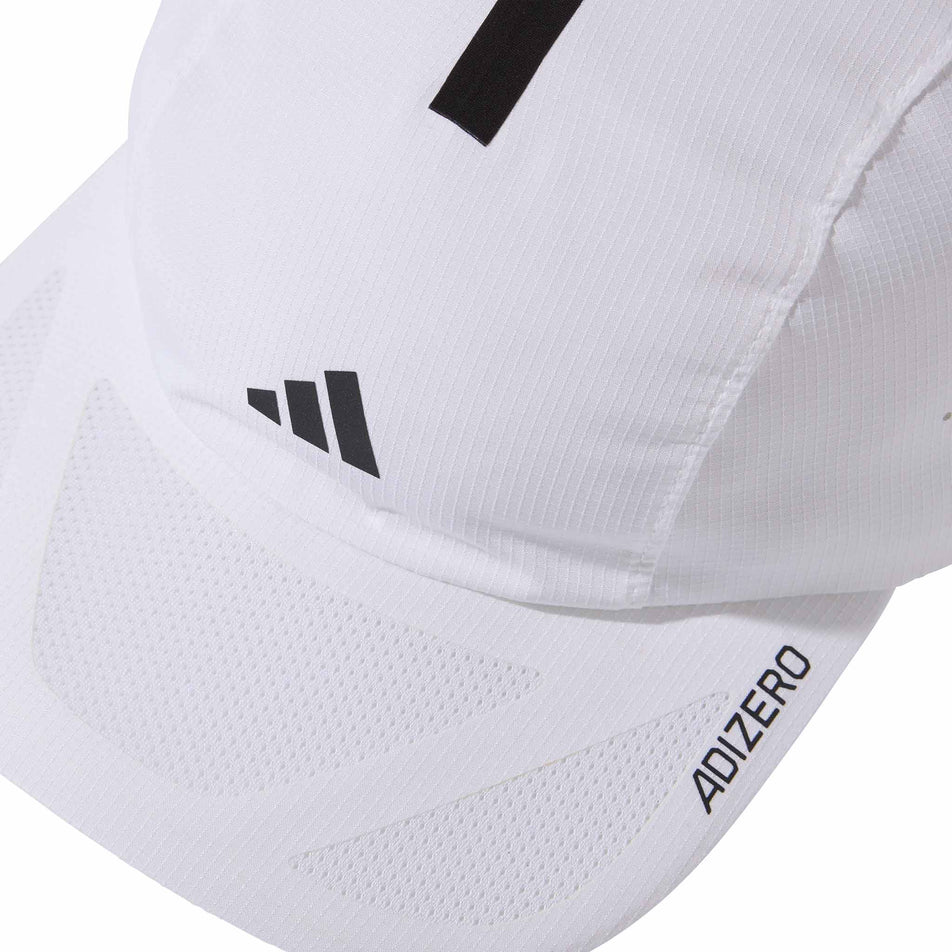 Front view of the adidas Unisex Run x Adizero Cap in the White/Black colourway.