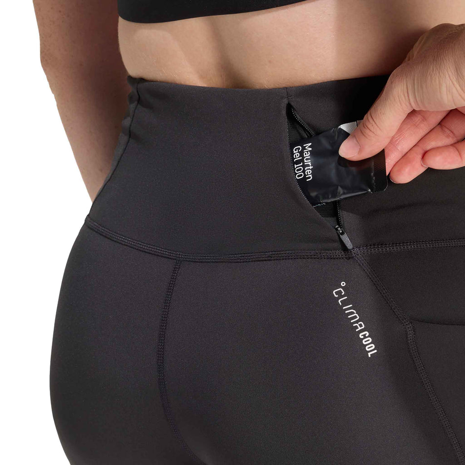 The zip pocket on the back of the adidas Women's adi365 Climacool Running Short Leggings in the Black colourway.