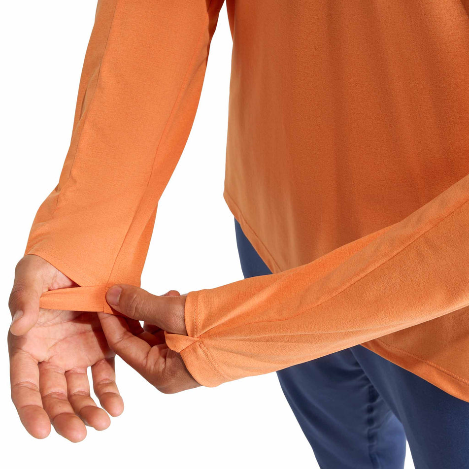 The thumb loops on the adidas Men's adi365 Long Sleeve in the Dusky Orange colourway.