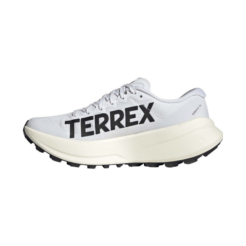 Medial view of the right shoe from a pair of adidas Women's Terrex Agravic SL Running Shoes in the Ftwr White/Core Black/Ftwr White colourway.