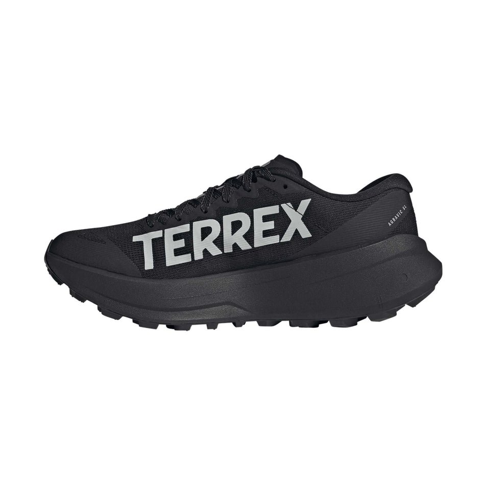 Medial view of the right shoe from a pair of adidas Men's Terrex Agravic SL Running Shoes in the Core Black/Grey Two/Core Black colourway.