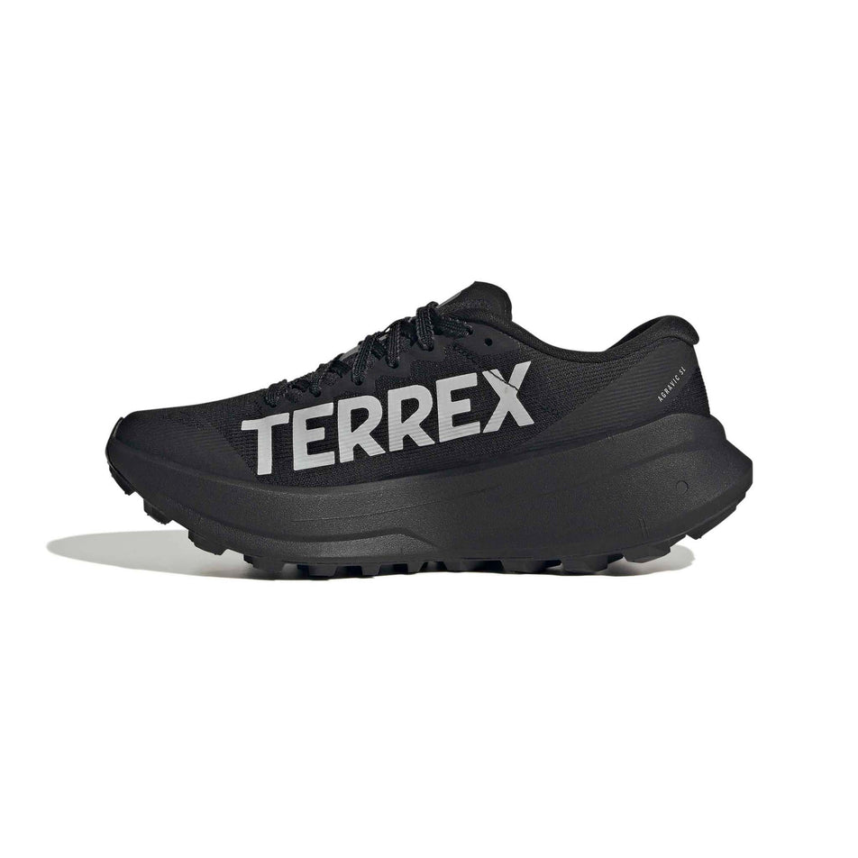 Medial view of the right shoe from a pair of adidas Women's Terrex Agravic SL Running Shoes in the Core Black/Grey Two/Core Black colourway.