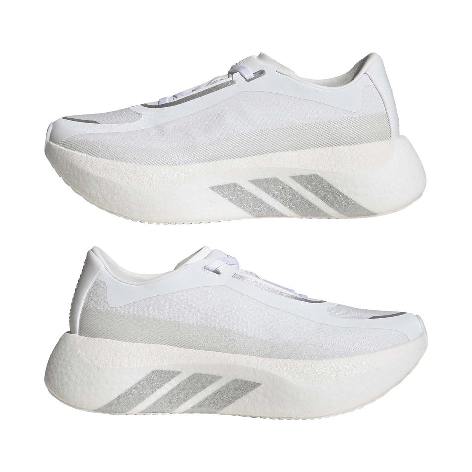 A pair of adidas Women's Hyperboost Edge Running Shoes in the Ftwr White/Silver Met./Zero Met. colourway.