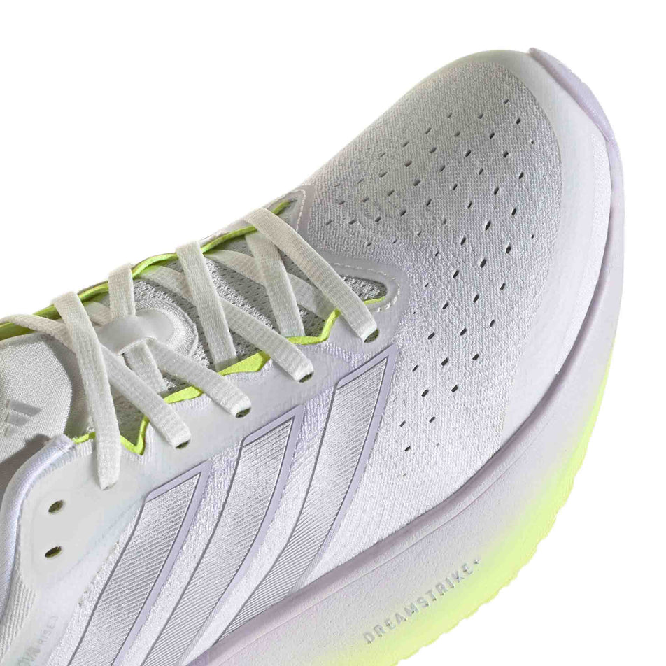 The toe box of the right shoe from a pair of adidas Women's Supernova Rise 3 Running Shoes in the Crystal White/Silver Met./Purple Tint colourway.