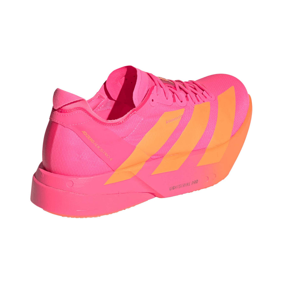 Lateral view of the right shoe from a pair of adidas Men's Adizero Adios Pro 4 Running Shoes in the Lucid Pink/Lucid Orange/Iron Met. colourway.