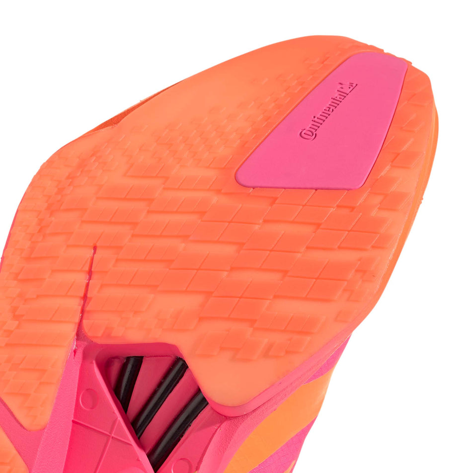 The outsole of the right shoe from a pair of adidas Women's Adizero Adios Pro 4 Running Shoes in the Lucid Pink/Lucid Orange/Iron Met. colourway.
