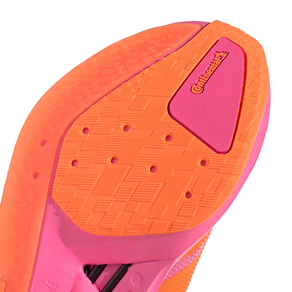 Close-up view of the outsole rubber of the right shoe from a pair of adidas Women's Adizero Boston 13 Running Shoes in the Lucid Pink/Lucid Orange/Iron Met. colourway.