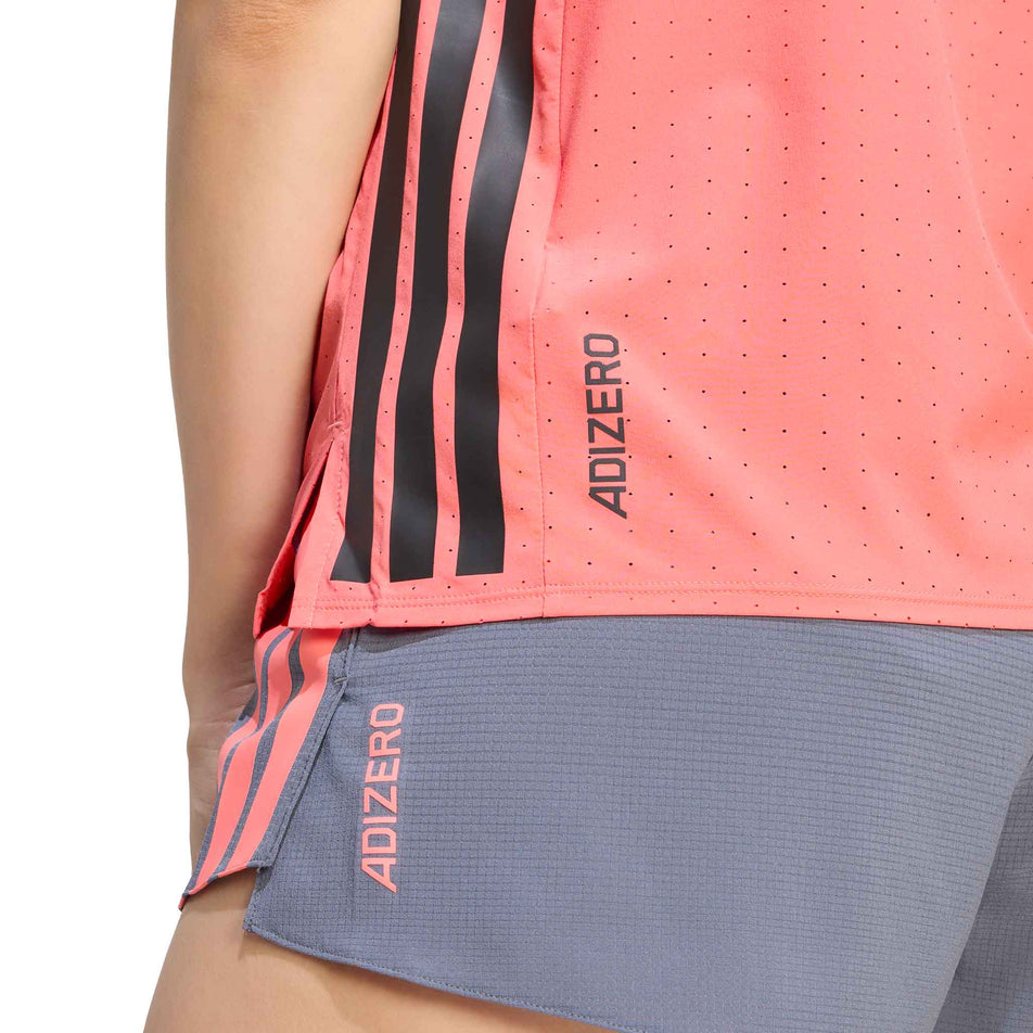 Close-up view of the Adizero branding on the adidas Women's Adizero Tee in the Semi Turbo colourway.
