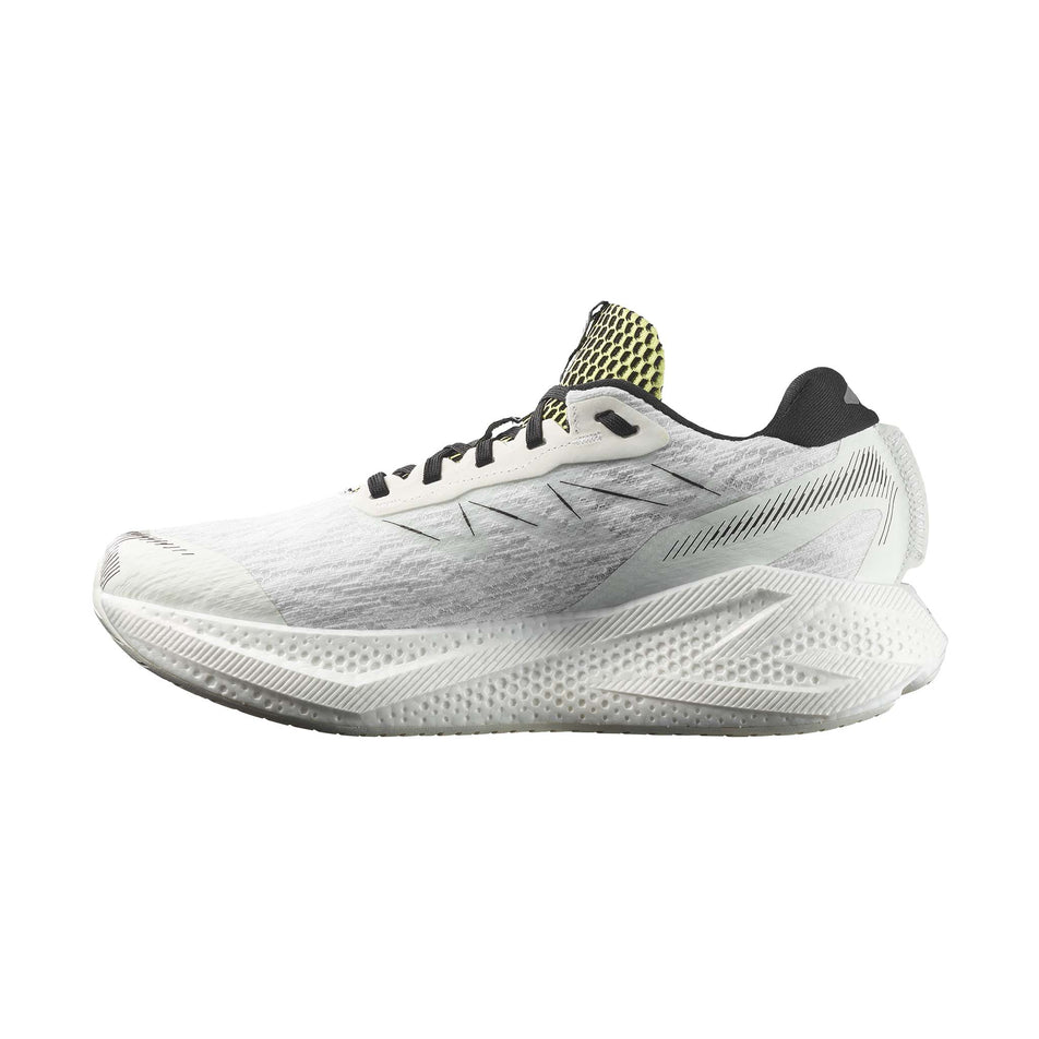 Medial view of the right shoe from a pair of Salomon Men's Aero Glide 4 Running Shoes in the White/Sunny Lime colourway.