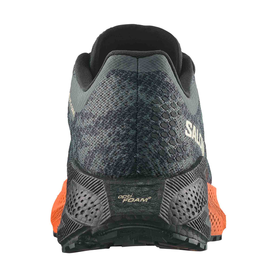The back of the right shoe from a pair of Salomon Men's Aero Glide 4 GRVL Running Shoes in the Urban Chic/Black colourway.