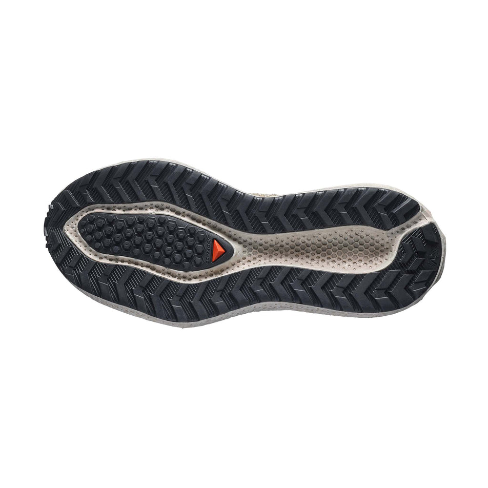 The outsole of the right shoe from a pair of Salomon Women's Aero Glide 4 GRVL Running Shoes in the Tapioca/Desert Tan colourway.