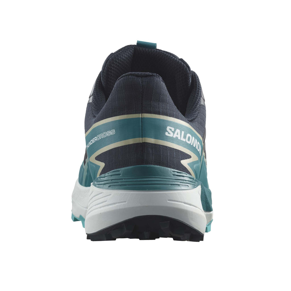 Back of the right shoe from a pair of Salomon Men's Thundercross Trail Running Shoes in the Carbon/Tahitian Tide/Peacock Blue colourway (8157904699554)
