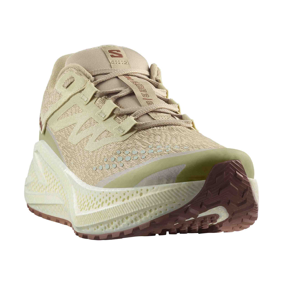 Front view of the right shoe from a pair of Salomon Men's Aero Glide 3 GRVL Running Shoes in the Green Haze/Vanilla Ice/Russet colourway. (8644590469282)