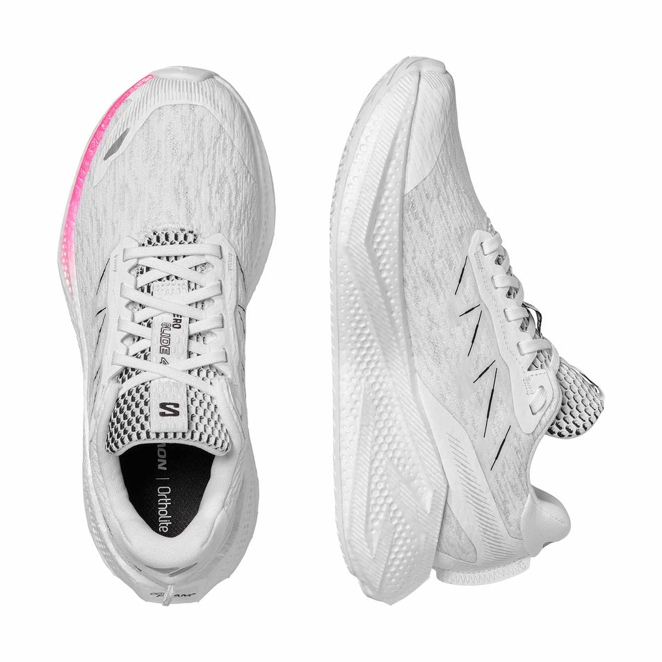 A pair of Salomon Women's Aero Glide 4 Running Shoes in the White/White/Black colourway.