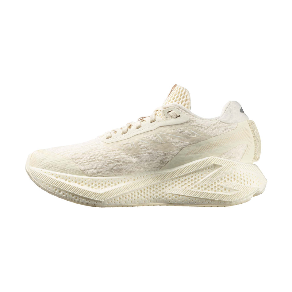 Medial view of the right shoe from a pair of Salomon Women's Aero Glide 4 Running Shoes in the Vanilla Ice/Vanilla Ice/White colourway.