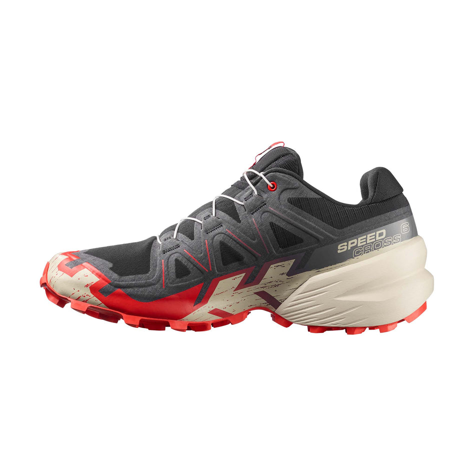 Medial view of the right shoe from a pair of Salomon Men's Speedcross 6 Running Shoes in the Black/Fiery Red/Almond Milk colourway.