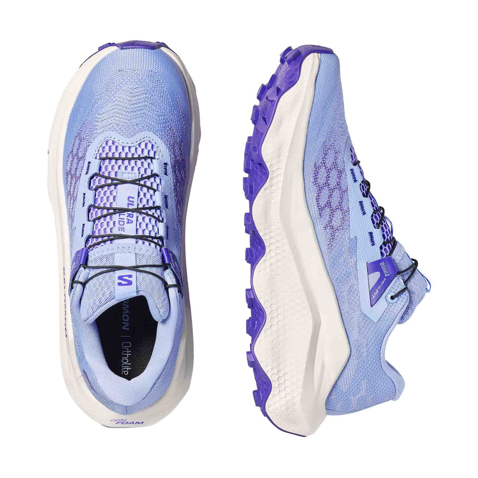 A pair of Salomon Women's Ultra Glide 4 Running Shoes in the Brunnera Blue/Vanilla Ice/Deep Blue colourway.