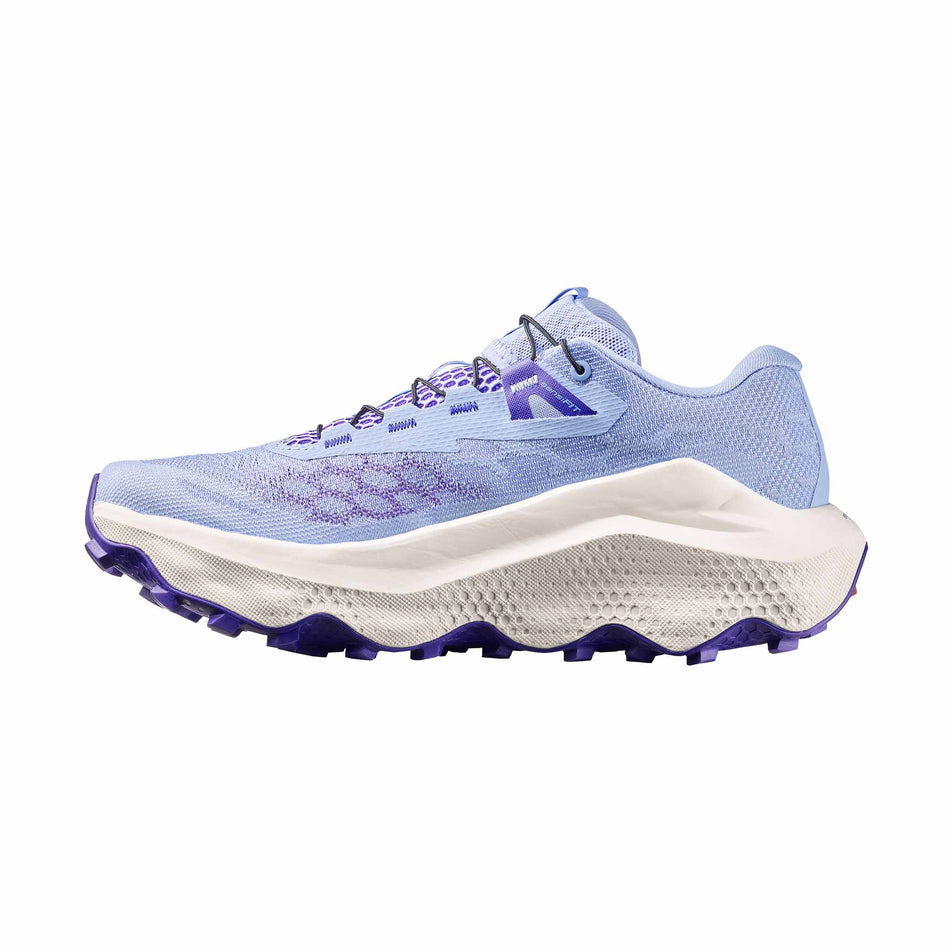 Medial view of the right shoe from a pair of Salomon Women's Ultra Glide 4 Running Shoes in the Brunnera Blue/Vanilla Ice/Deep Blue colourway.
