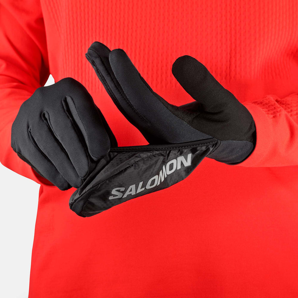 A model wearing a pair of Salomon Unisex Fast Wing Winter Gloves in the Deep Black colourway (8071119569058)