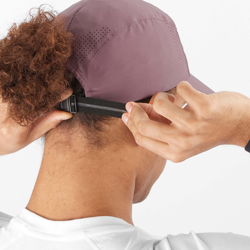 Back view of a model wearing a Salomon Unisex Cross Compact Cap in the Moonscape colourway (8008807088290)