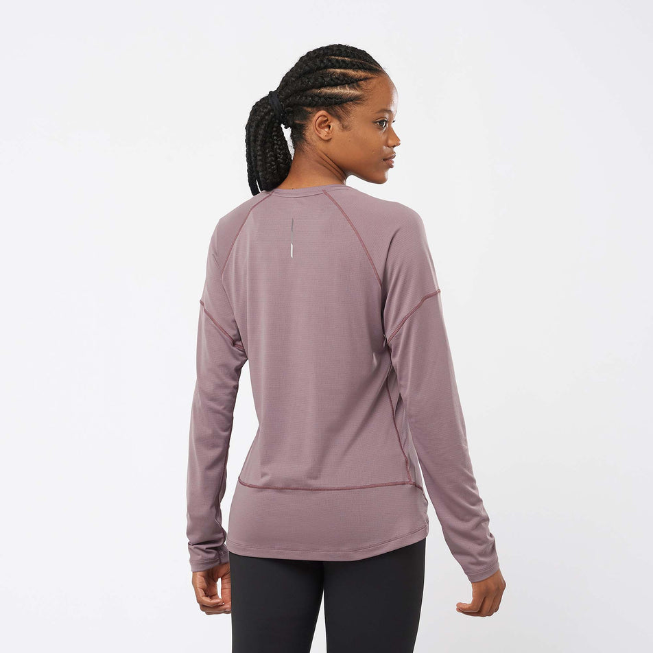 Back view of a model wearing a Salomon Women's Cross Run Long Sleeve T-Shirt in the Moonscape colourway (7999421317282)