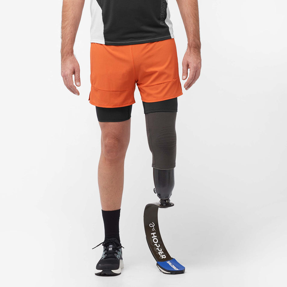 Front view of a model wearing a pair of Salomon Men's Sense Aero 2in1 Shorts in the Burnt Ochre colourway (8008583315618)