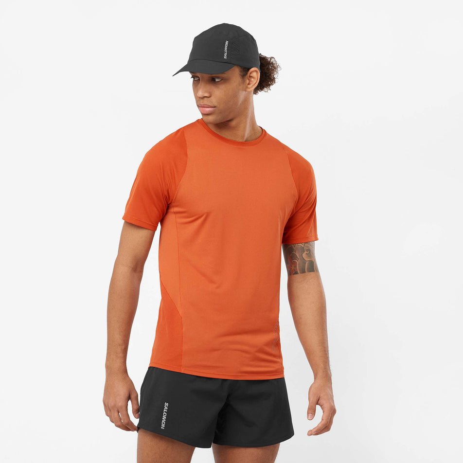 Front view of a model wearing a Salomon Men's Sense Aero Short Sleeve T-Shirt in the Burnt Ochre colourway (8008572928162)
