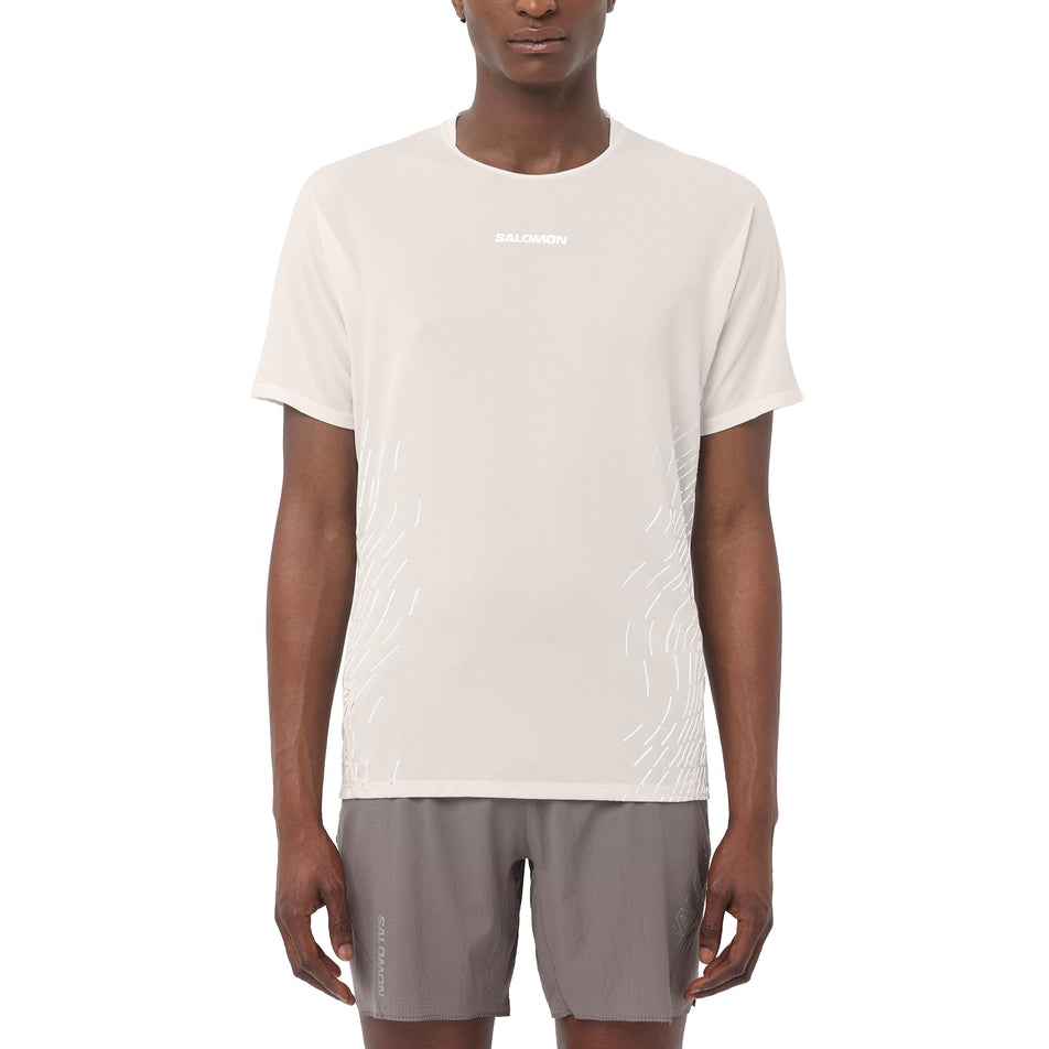 Front view of a model wearing the Salomon Men's Sense Aero Graphic Short Sleeve T-Shirt in the Whisper White/White colourway. (8736777601186)