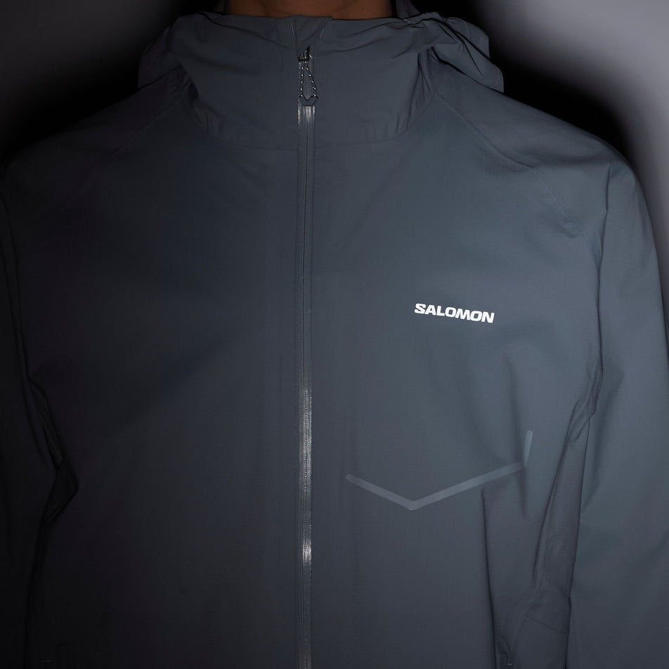 Front view of a model wearing the Salomon Women's Bonatti Waterproof Jacket in the Trade Winds colourway.
