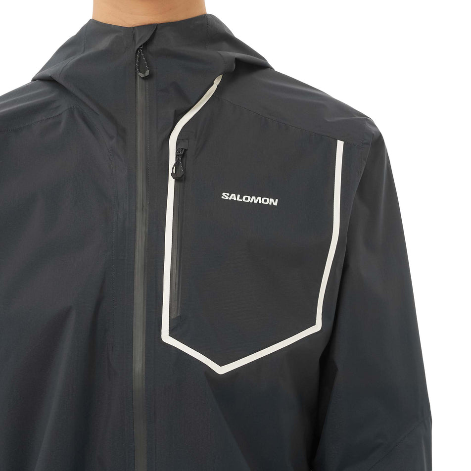 Front view of a model wearing the Salomon Women's Bonatti Pro Shell Jacket in the Deep Black colourway.