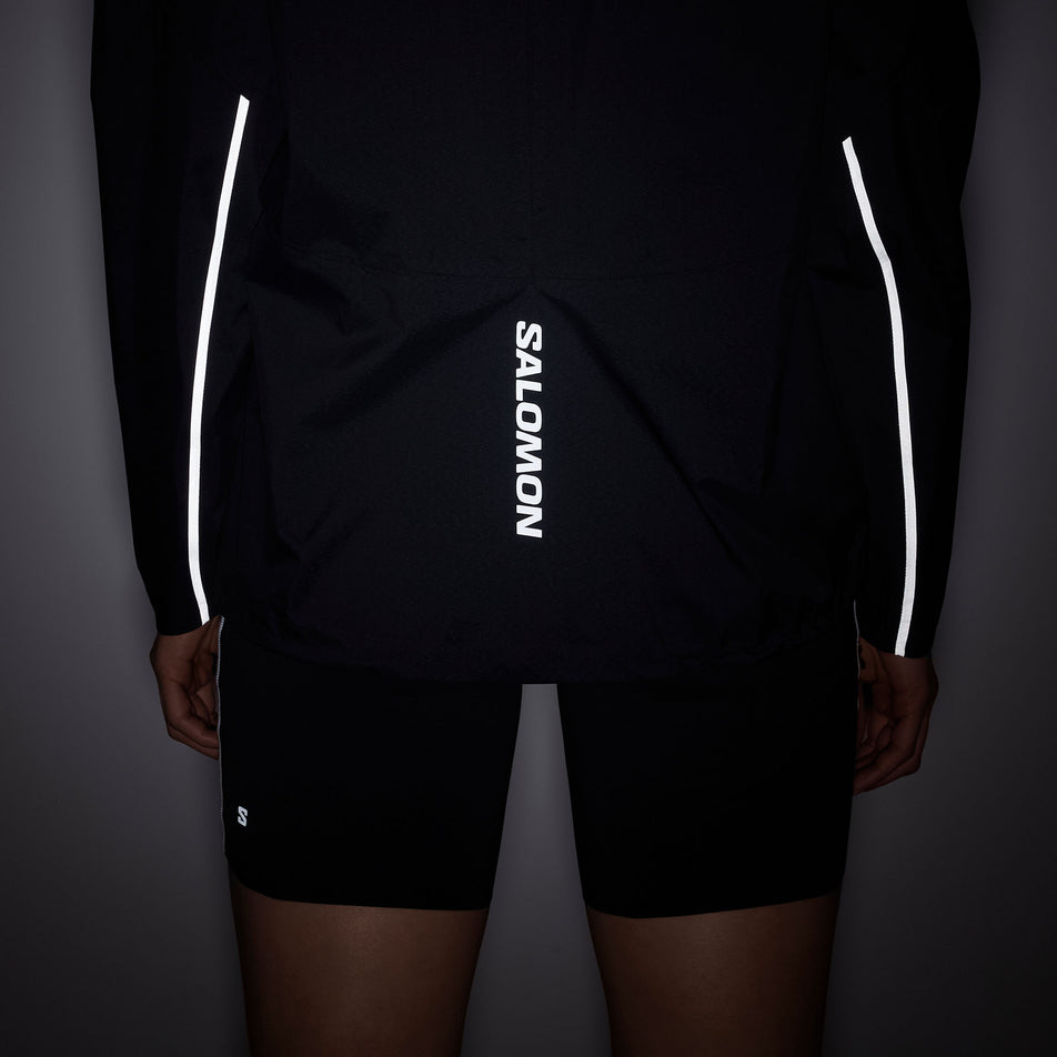 The reflective graphics on the Salomon Women's Bonatti Pro Shell Jacket in the Deep Black colourway.