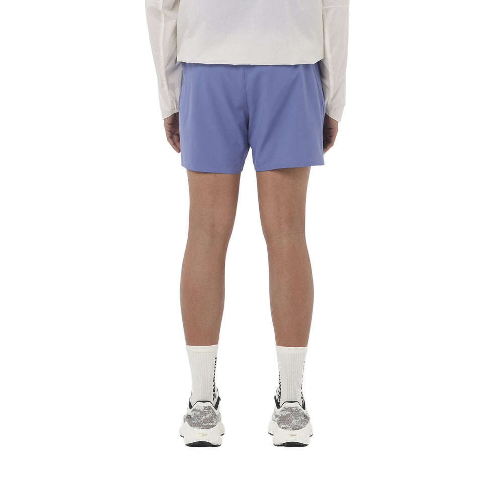 Back view of a model wearing the Salomon Men's SHKout Core Shorts 5