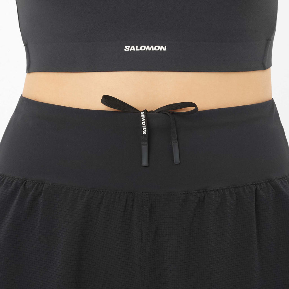 Front view of a model wearing the Salomon Women's Sense Aero 4