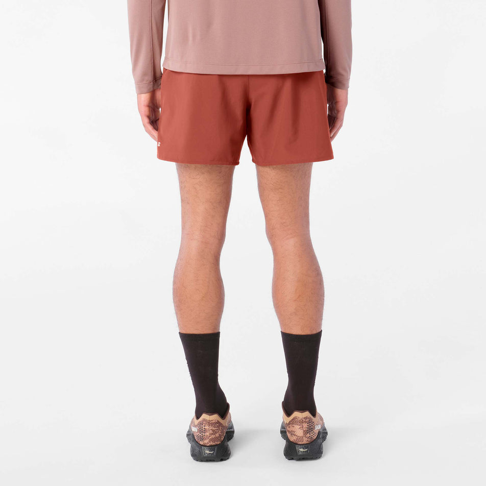 Back view of a model wearing the Salomon Men's Shakeout Core Shorts 5