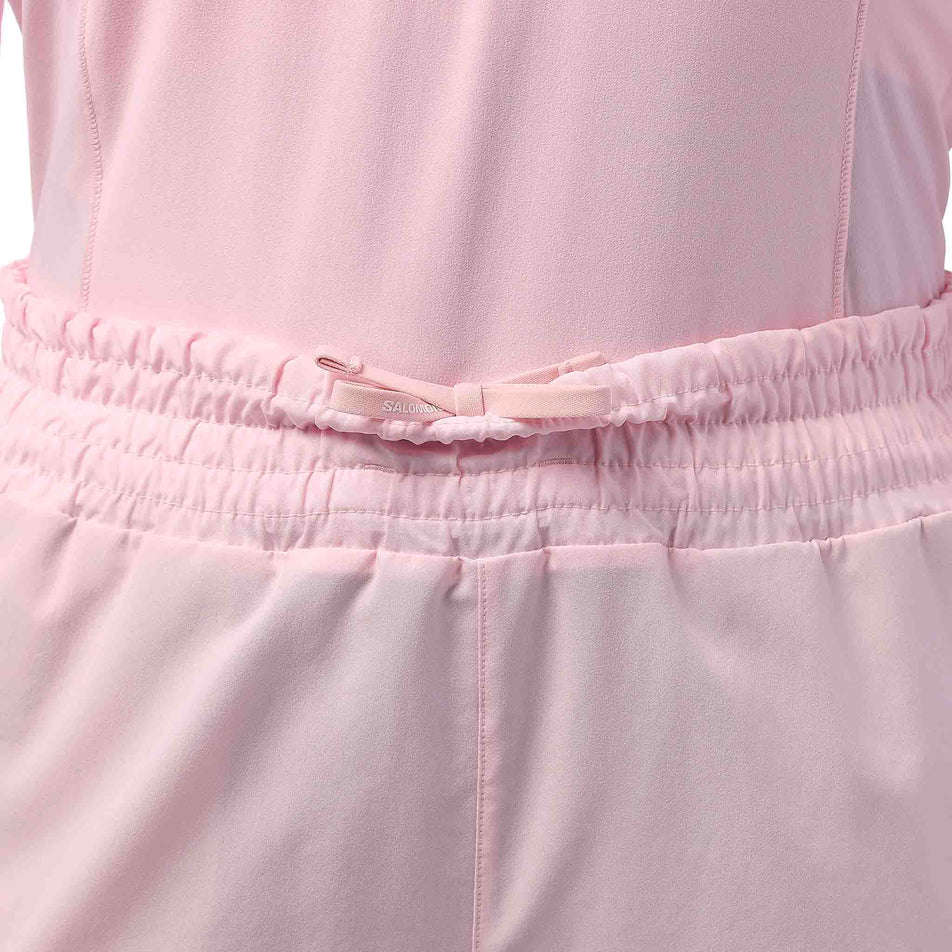 Front view of a model wearing the Salomon Women's Shakeout Core Shorts 4