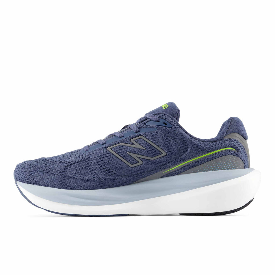 Medial view of the right shoe from a pair of New Balance Men's 1080 V15 Running Shoes in the Vintage Indigo colourway.