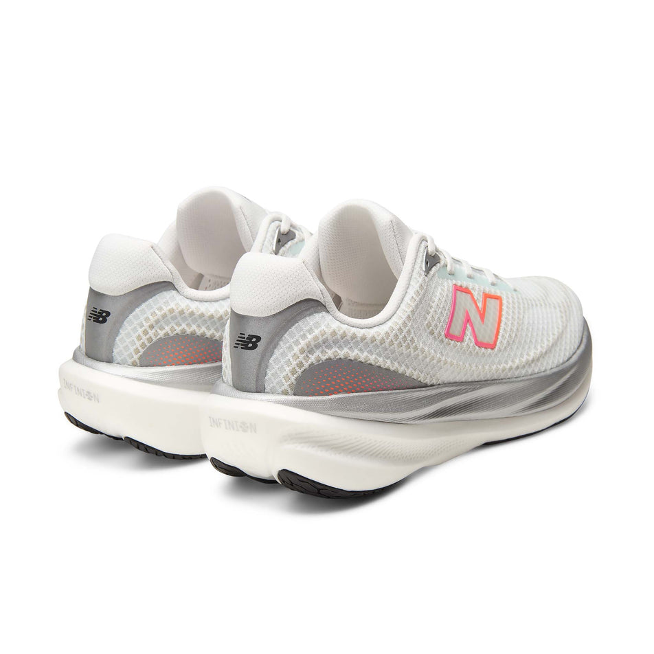 A pair of New Balance Men's 1080 V15 Running Shoes in the White/Pink Heat colourway.