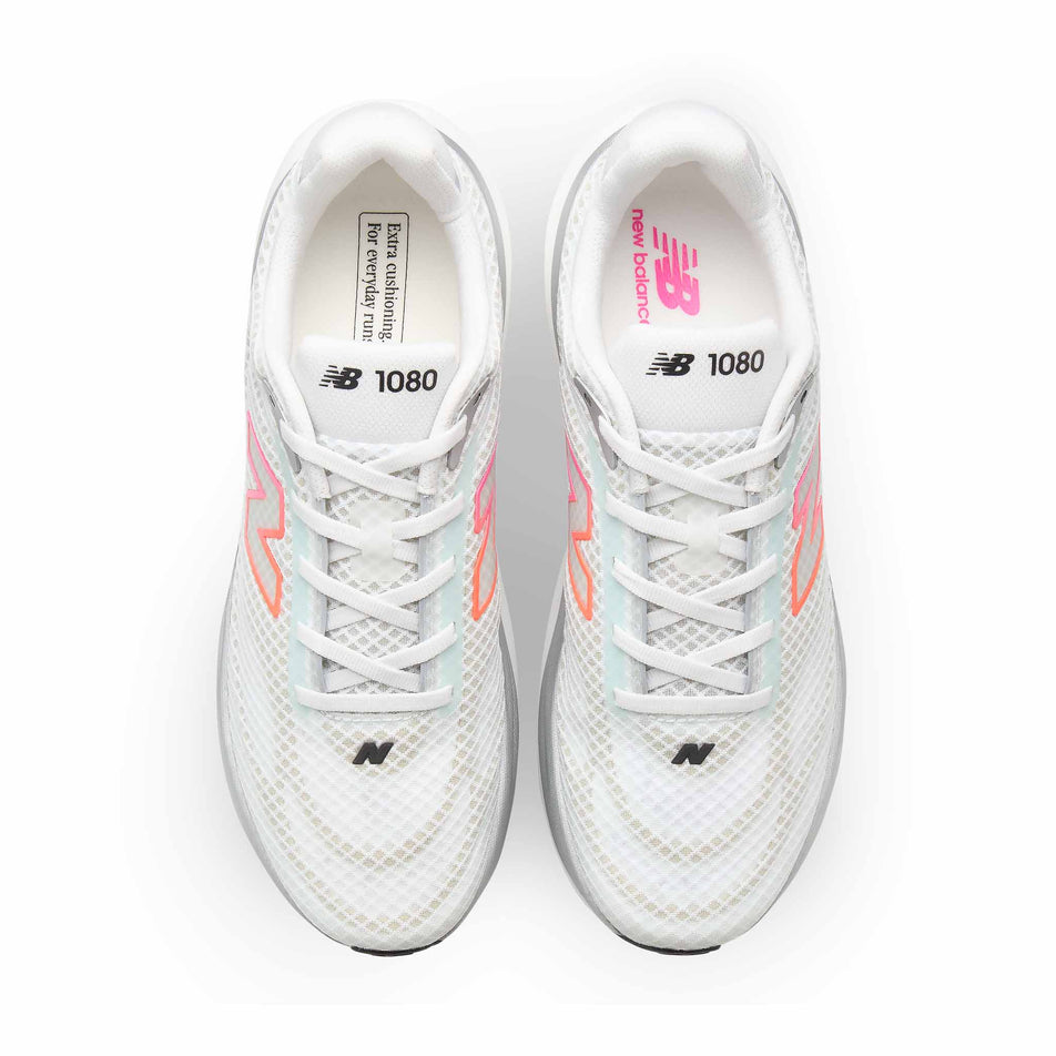 The uppers of a pair of New Balance Men's 1080 V15 Running Shoes in the White/Pink Heat colourway.