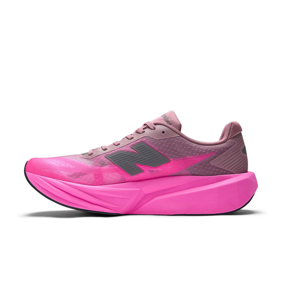Medial view of the right shoe from a pair of New Balance Men's Fuelcell Rebel V5 Running Shoes in the Pink Heat/Rosewood colourway.