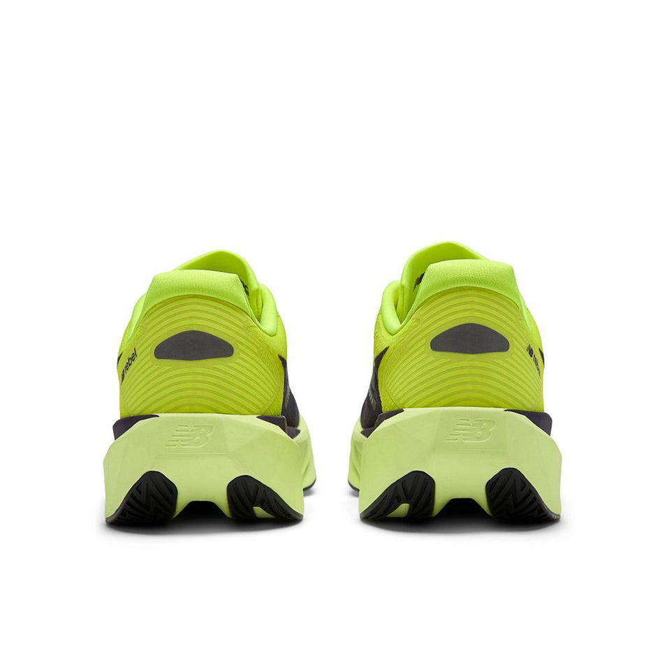 The back of a pair of New Balance Men's Fuelcell Rebel V5 Running Shoes in the Alkaline Green colourway.