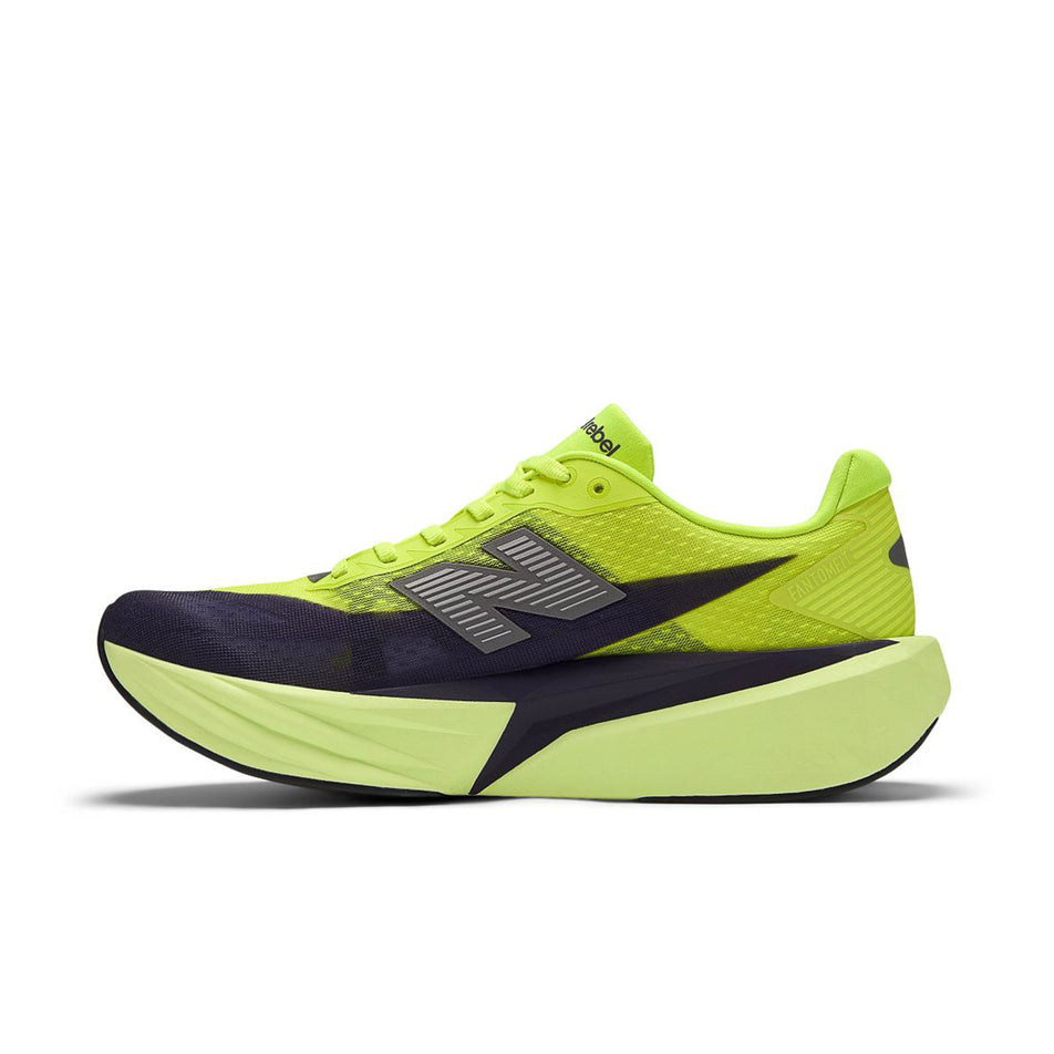 Medial view of the right shoe from a pair of New Balance Men's Fuelcell Rebel V5 Running Shoes in the Alkaline Green colourway.