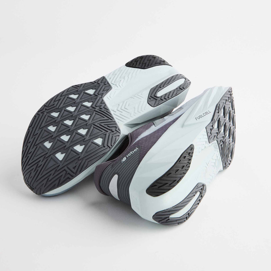 A pair of New Balance Men's Fuelcell Rebel V5 Running Shoes in the Magnet/Light Zinc Blue colourway.