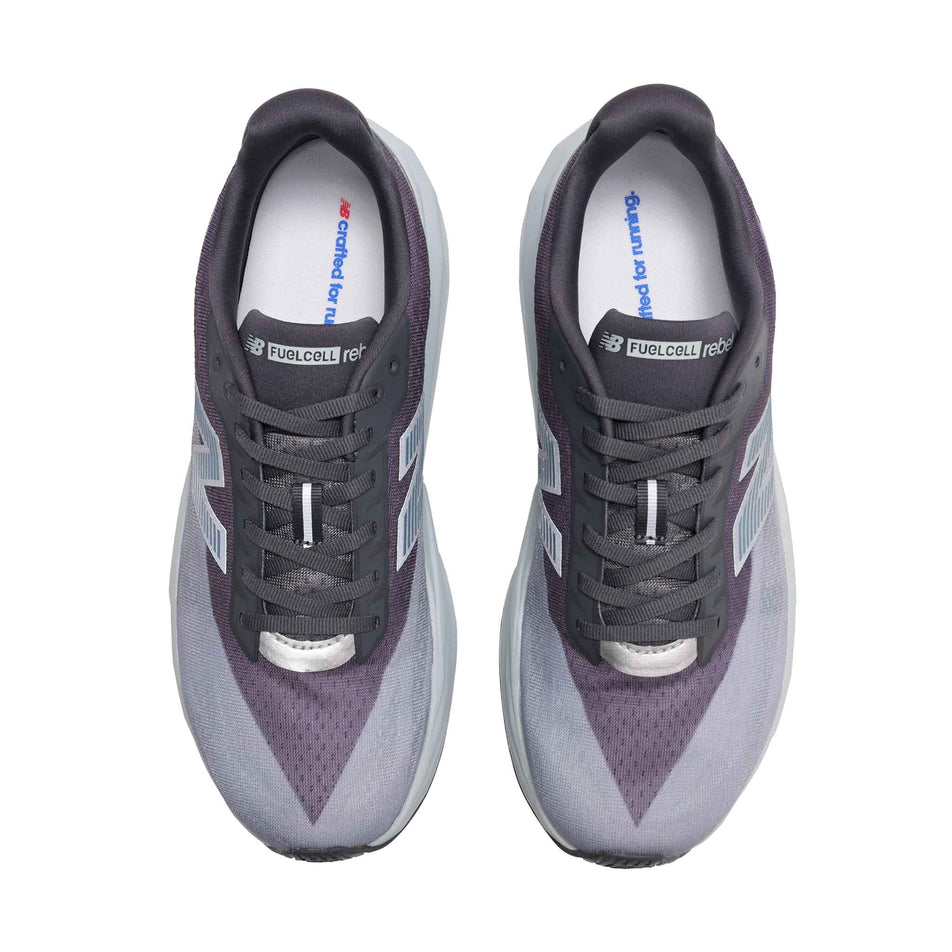 The uppers of a pair of New Balance Men's Fuelcell Rebel V5 Running Shoes in the Magnet/Light Zinc Blue colourway.
