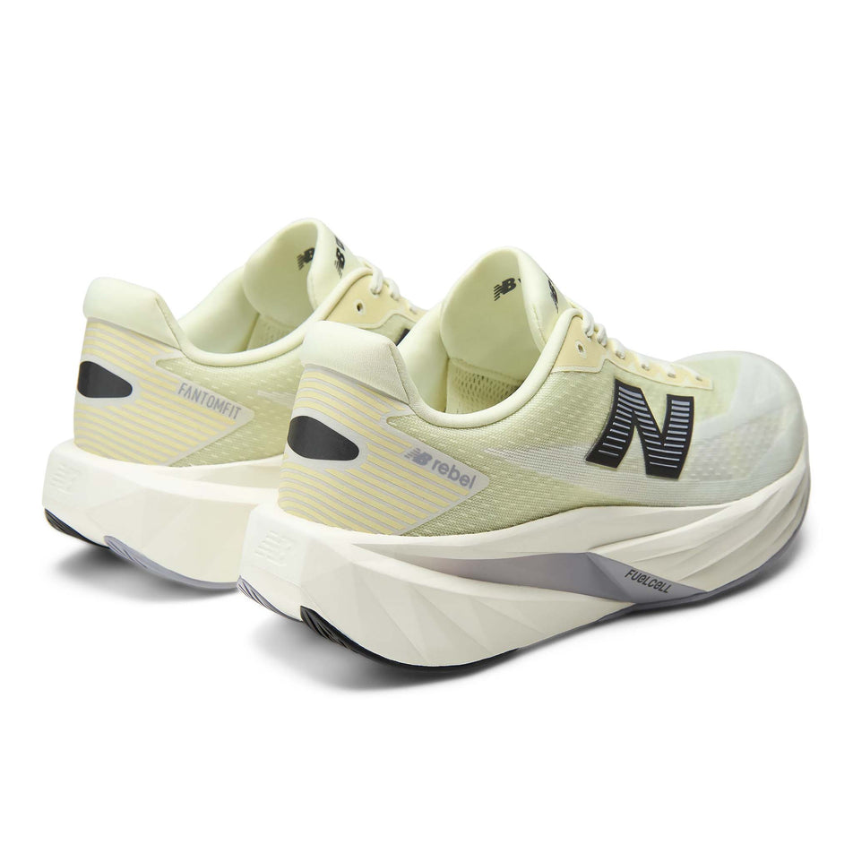 A pair of New Balance Men's Fuelcell Rebel V5 Running Shoes in the Pistachio Butter/Digital Mist colourway.