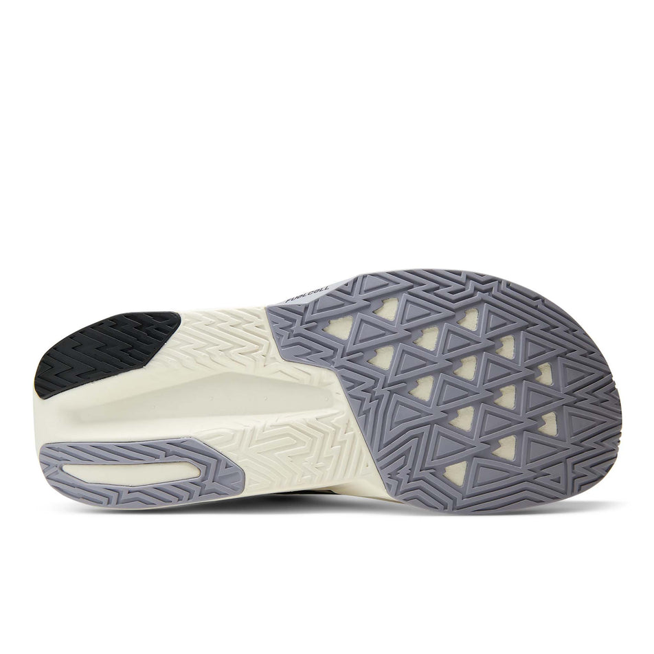 The outsole of the right shoe from a pair of New Balance Men's Fuelcell Rebel V5 Running Shoes in the Pistachio Butter/Digital Mist colourway.