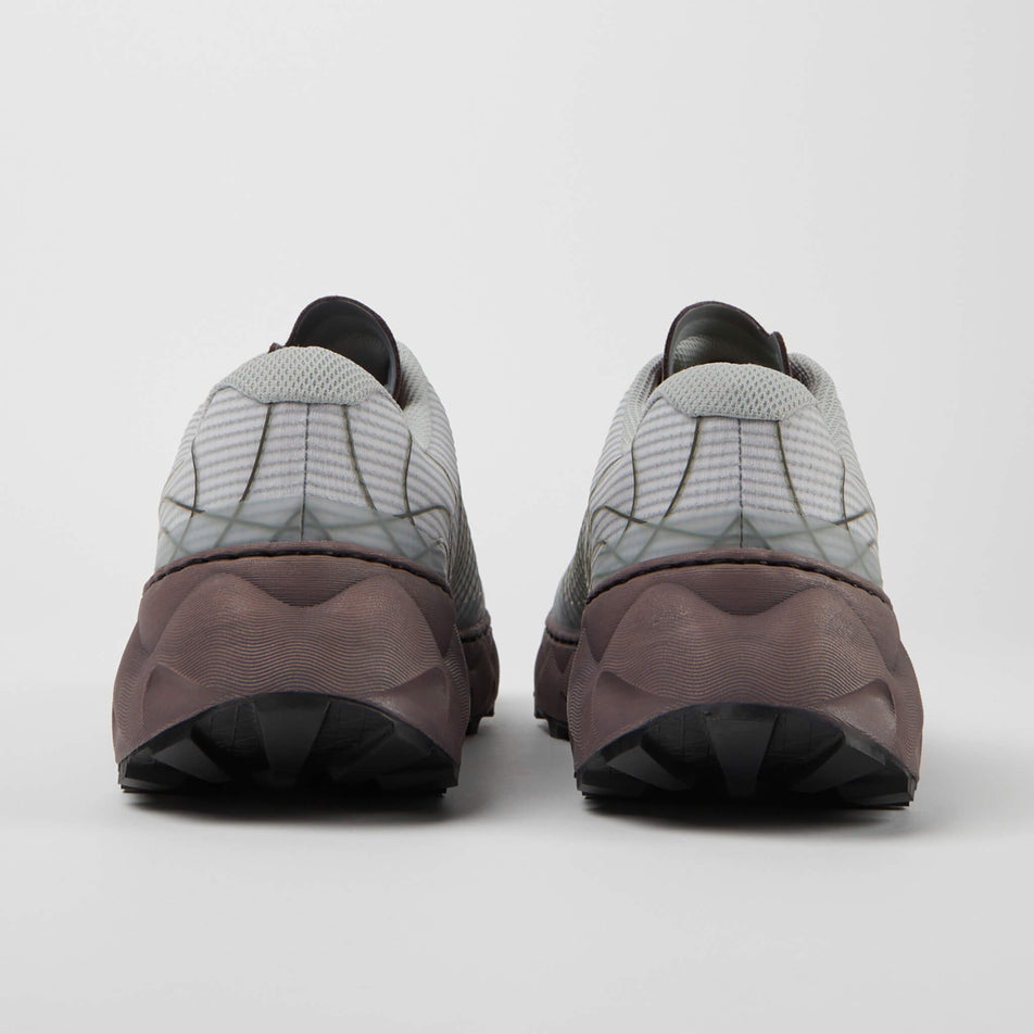 The back of a pair of NNormal Unisex Tomir Trail Running Shoes in the grey/purple colourway (7965392797858)