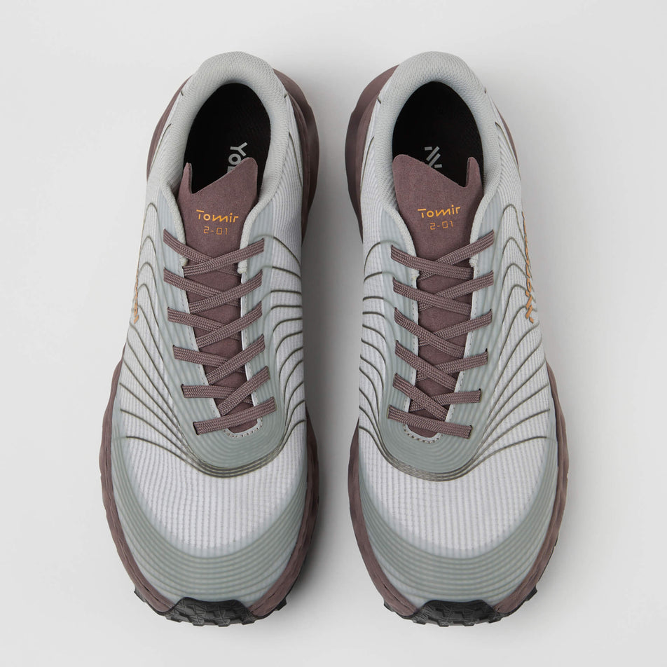 The uppers on a pair of NNormal Unisex Tomir Trail Running Shoes in the grey/purple colourway (7965392797858)
